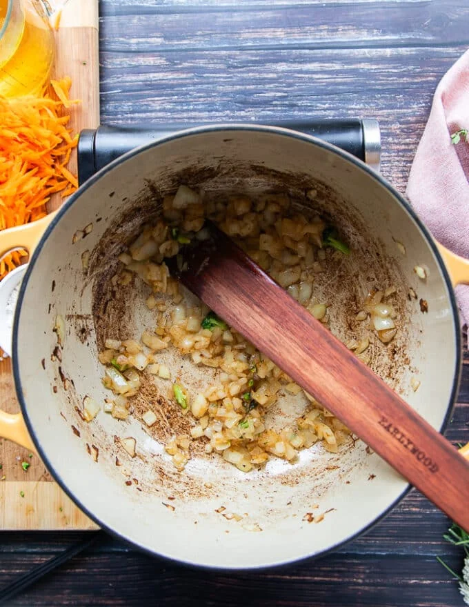 light golden and softened onions cooked as the base of the soup and the garlic is added.