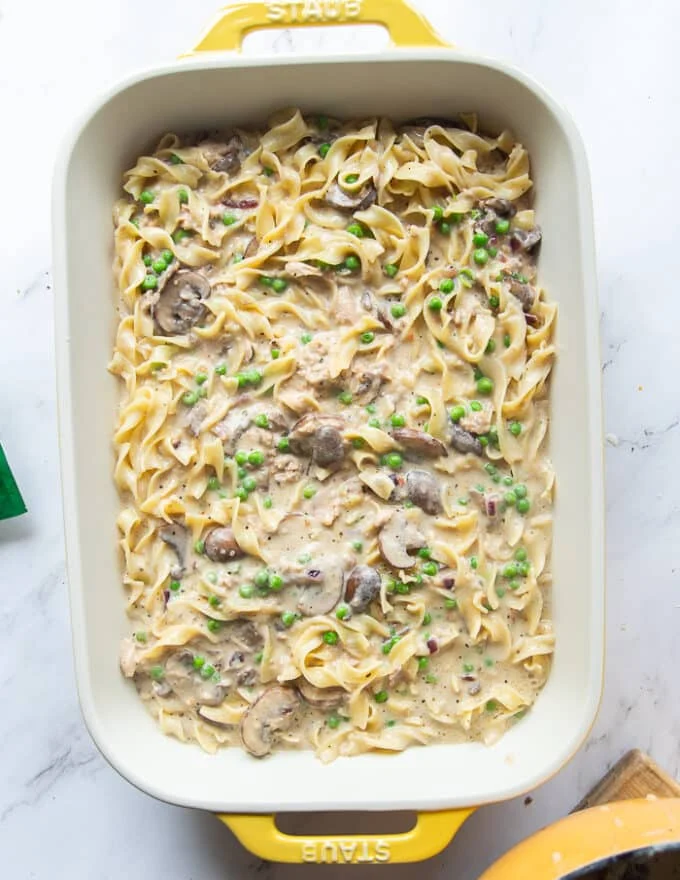 the noodles mixed into the post with the remaining ingredients and spread into a baking dish