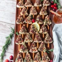 The board filled with chritsmas cheese trees assembled and ready to chill until serving