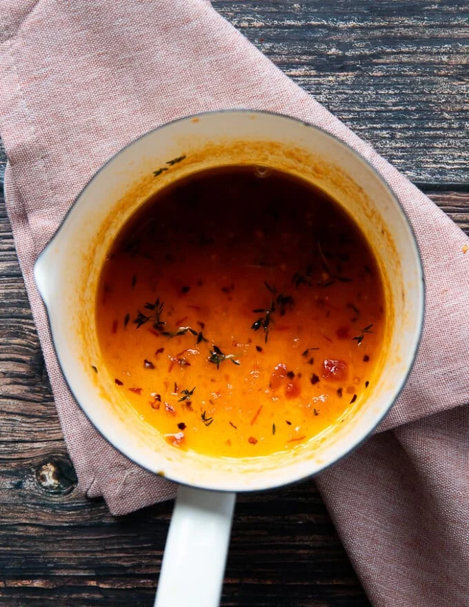 Honey and remaining seasoning is added to the pot and mixed. The honey glaze is now ready