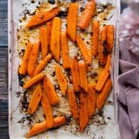 Roasted carrots out of the oven, golden, tender and ready for the other half of the glaze