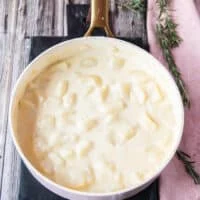 tender boiled potatoes in the pot ready to mash