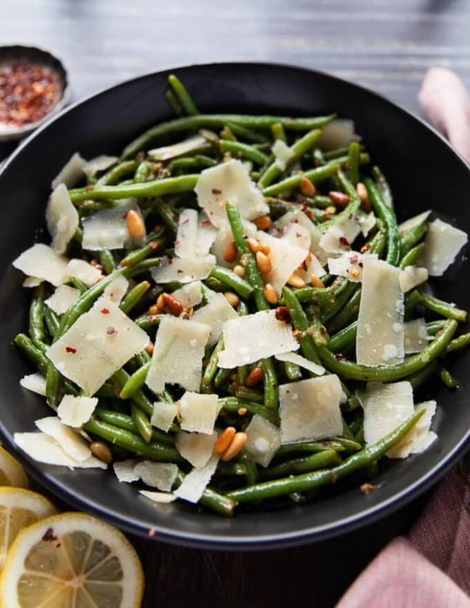 Perfectly cooked sautéed green beans on a plate
