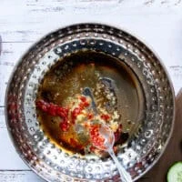 All the dressing ingredients added into a bowl