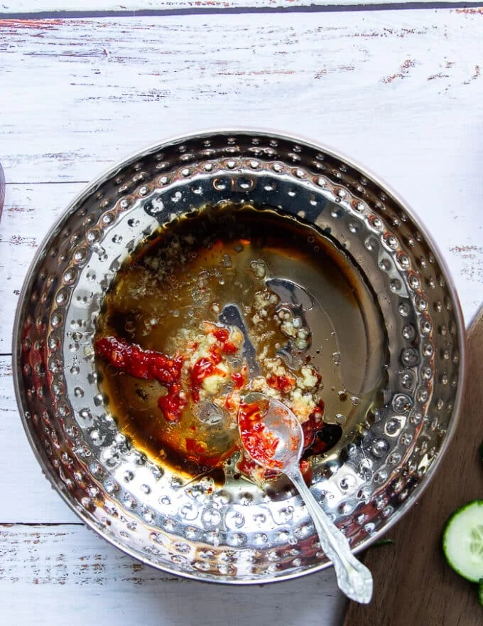 All the dressing ingredients added into a bowl