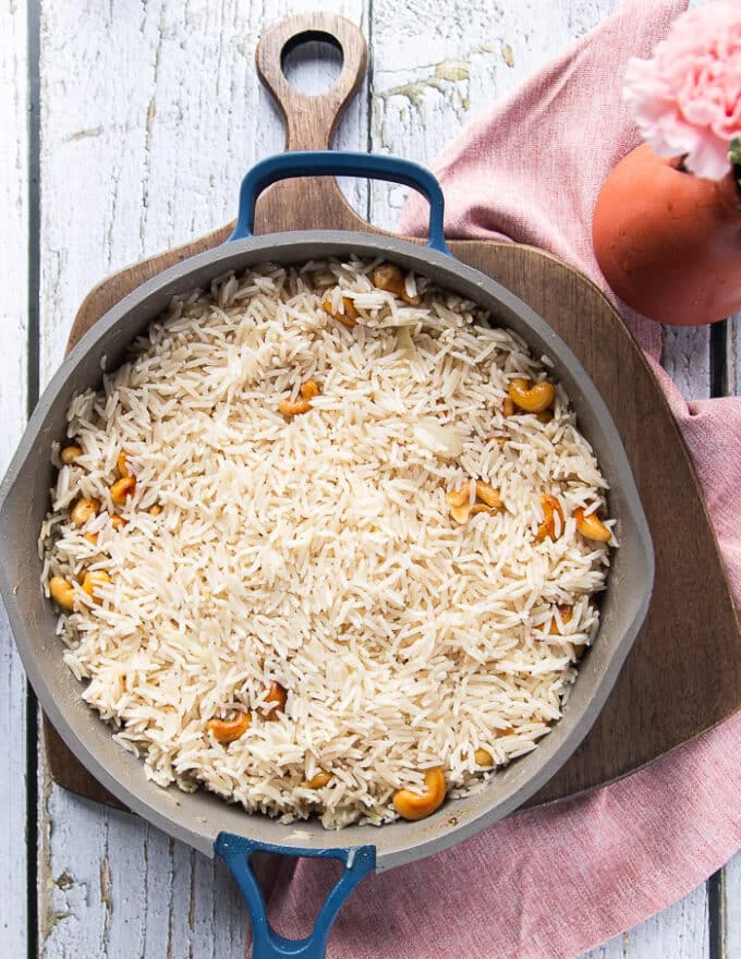 right after cooking, the pot is uncovered and the coconut rice is perfectly cooked
