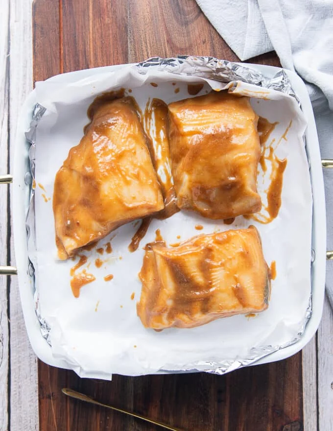 the miso marinade spread all over the black cod to marinate