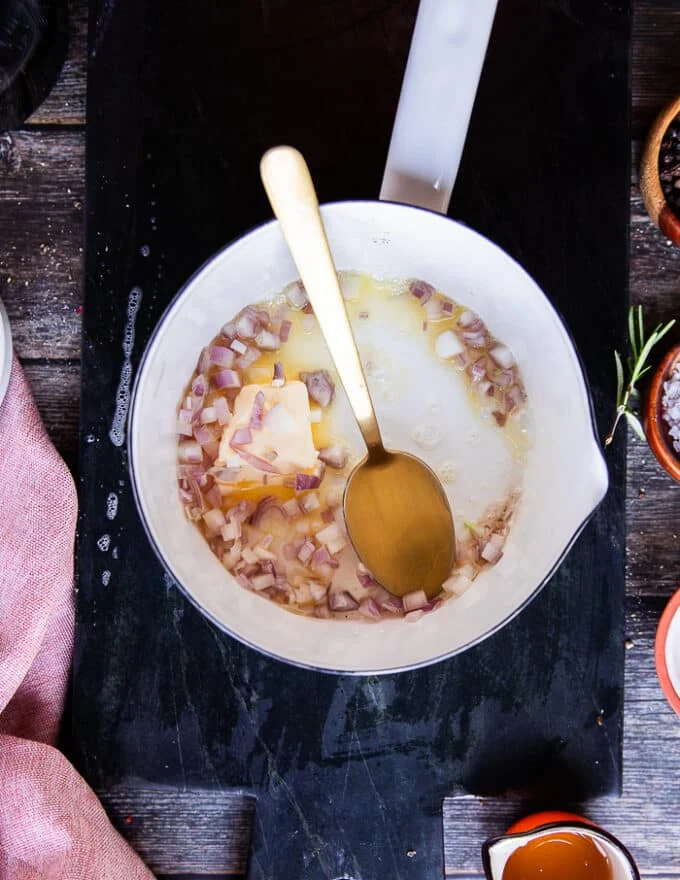 Shallots and butter in a small pot to make a balsamic glaze