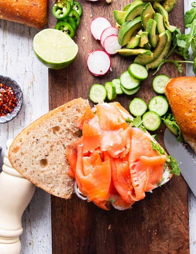 The smoked salmon piled over the bread and topping