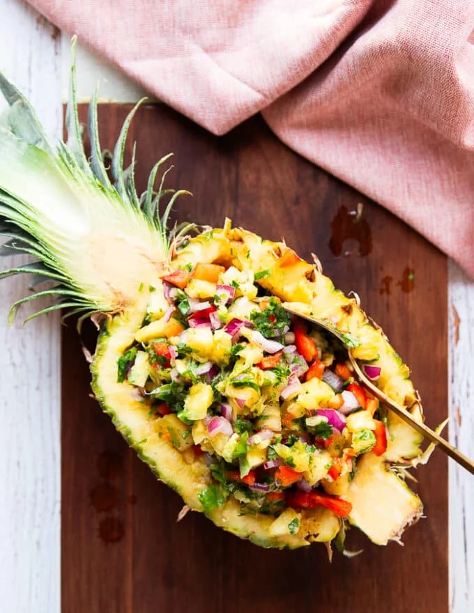 Optionally the pineapple salsa can be scooped back into the pineapple half shell for a beautiful presentation or served in a bowl