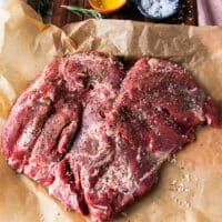 heavily salted and pepper boneless leg of lamb