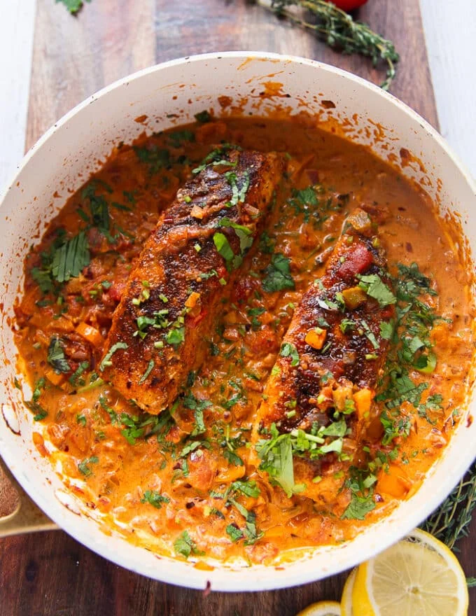 the chicken or halibut is retuned back to sauce to simmer and finish cooking if needed