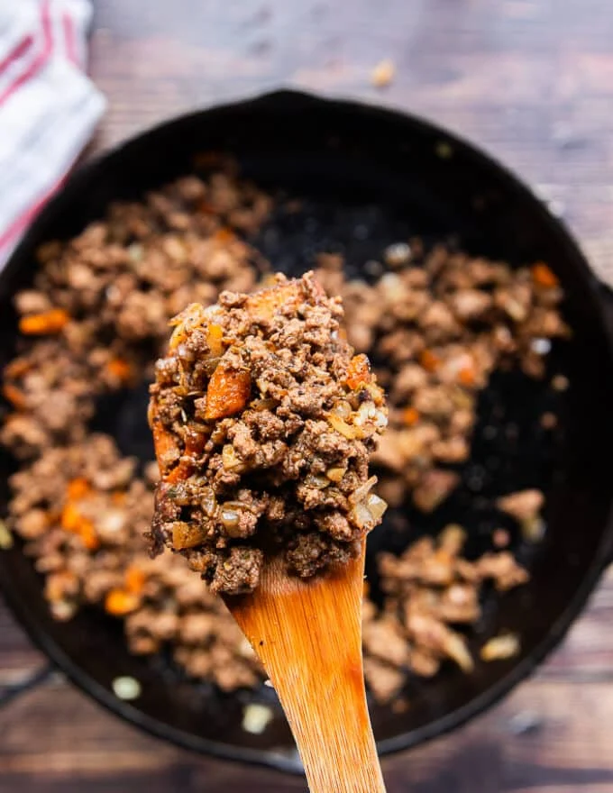The meat is perfectly cooked and brown, no longer pink in color so it's ready for sauce