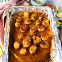 golden brown juicy scallops out of the broiler
