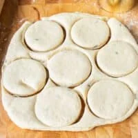 cut our circles of the biscuit dough on the surface