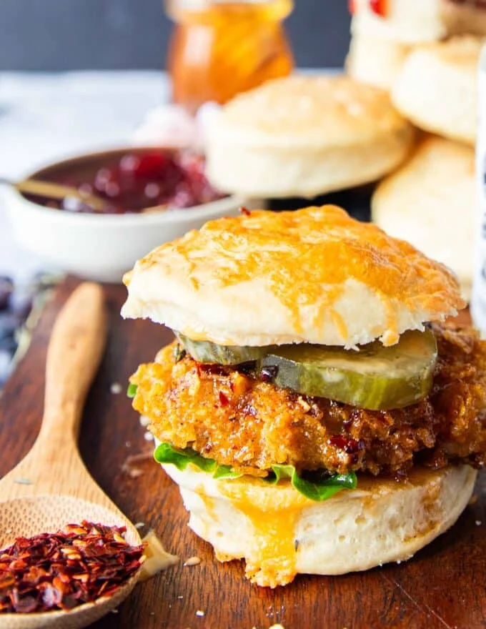 A hot honey chicken sandwich made using the mayonnaise biscuits