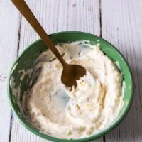 salmon burger sauce , or lemon aioli ready in a bowl