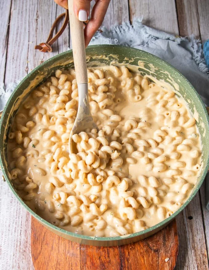 Cheese sauce and pasta all mixed well and laced together