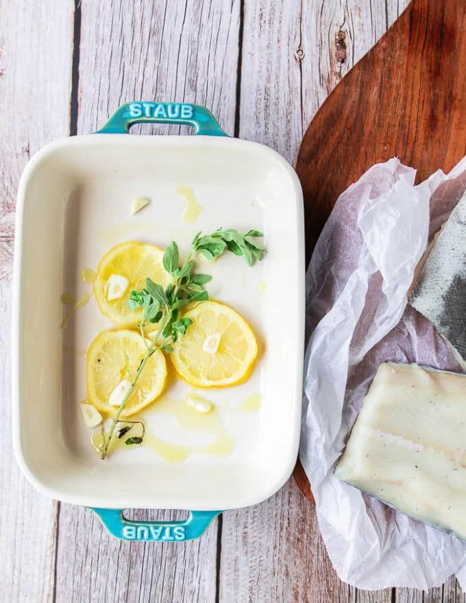 baking dish for baking chilean sea bass with lemon and herbs and garlic