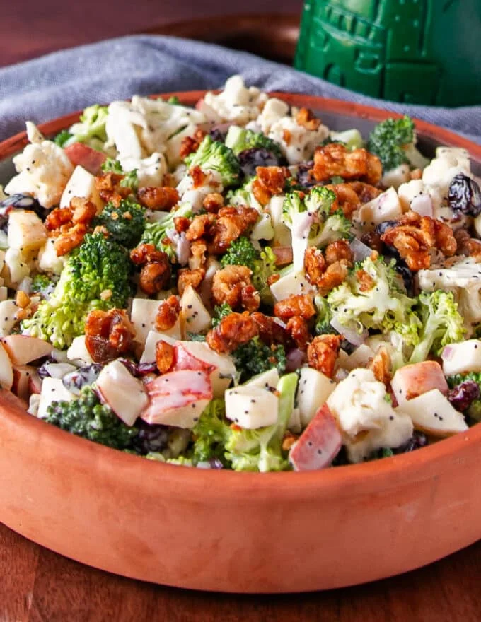 Very close image of the creamy and crunchy broccoli cauliflower salad