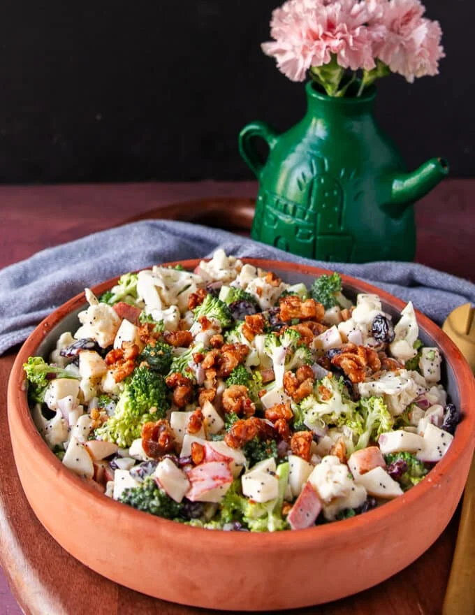 Close up of a creamy broccoli and cauliflower salad with creamy dressing