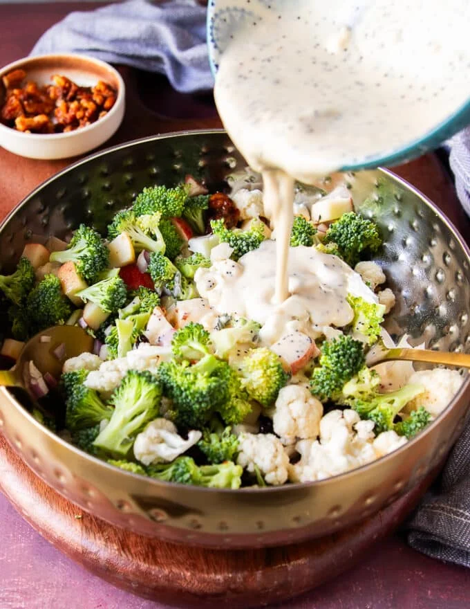 Salad dressing poured over the salad