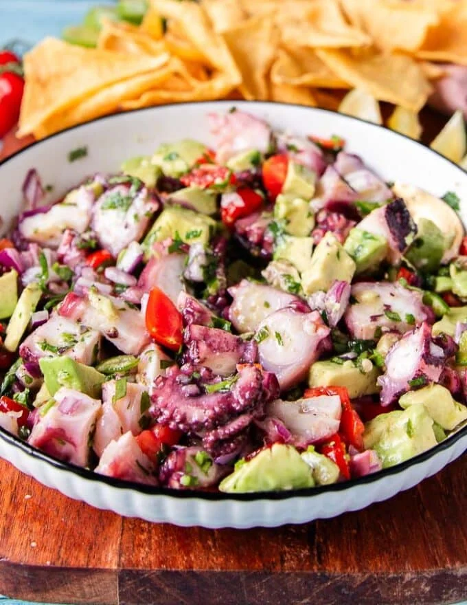 side view of octopus ceviche bowl showing close up textures