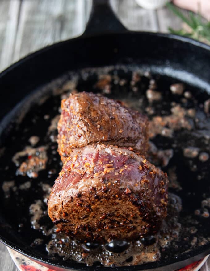 searing the sides of the thick filet mignon as well for maximum flavor