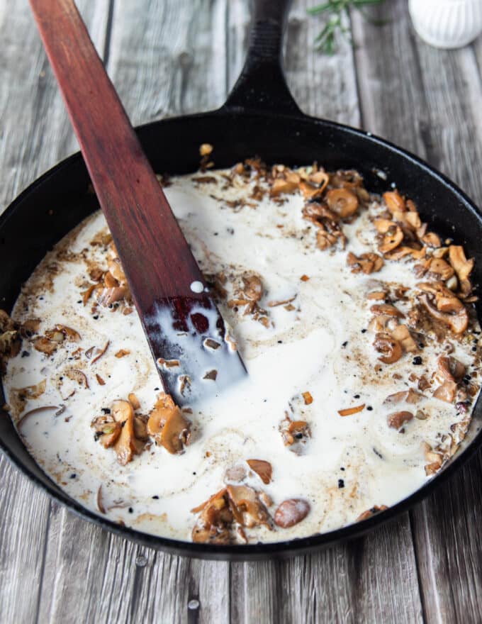 cream, mushard, herbs and Worcestershire sauce is added to the pan