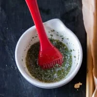 garlic herb butter mixed in a bowl to brush the slider bread buns
