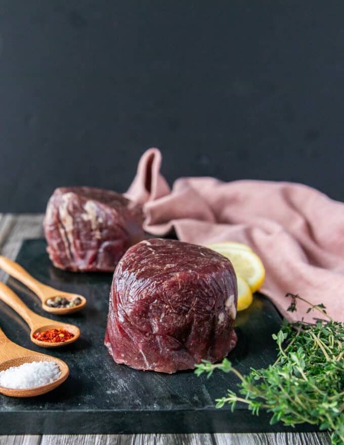 filet mignon raw close up showing the thick piece of center cut tenderloin