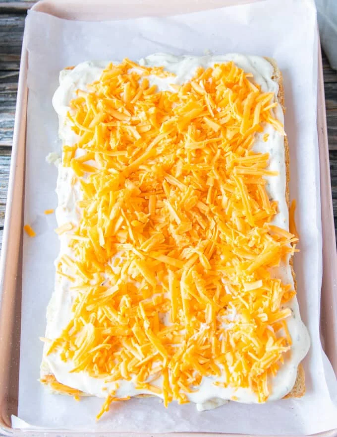 layer of cheese added over the ranch at the bottom of the slider bread
