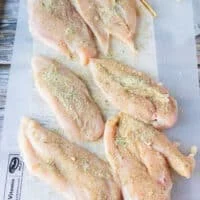Seasoned chicken breasts on both sides