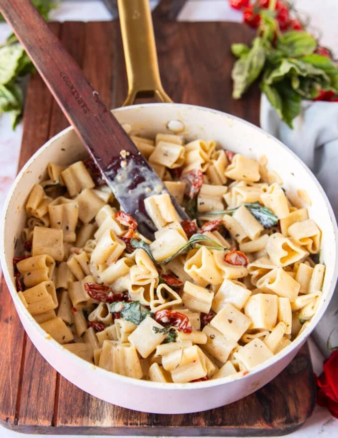 pasta tossed well into the sun dried tomato sauce