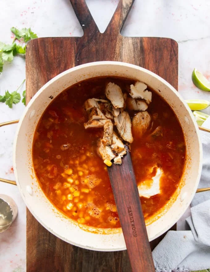beans, corn, chicken are all now added and the soup is ready to simmer until cooked