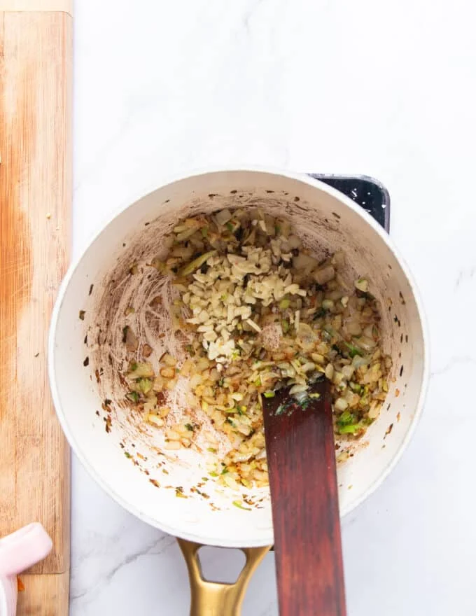 garlic is added to the pot