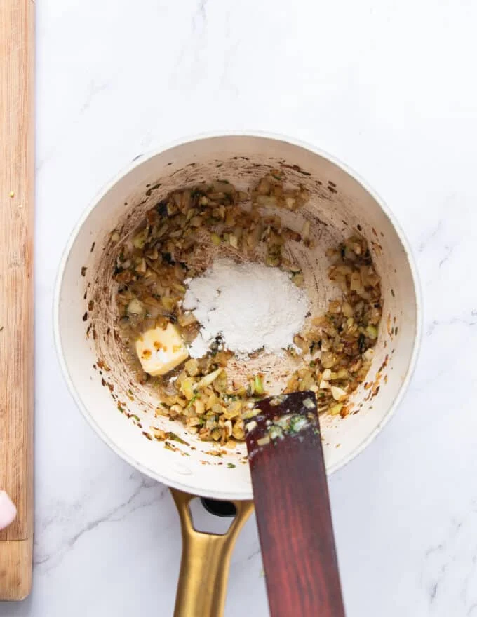the roux is made at the pot of the crab bisque to thicken it as a base