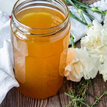 Perfectly cooled crab stock in a mason jar ready to store