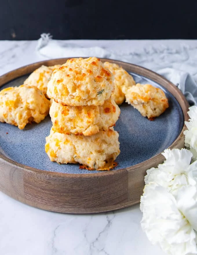 stacks of drop biscuits showing the fluffy texture
