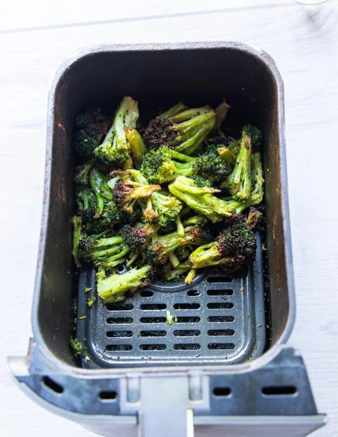 crispy broccoli florets in air fryer ready