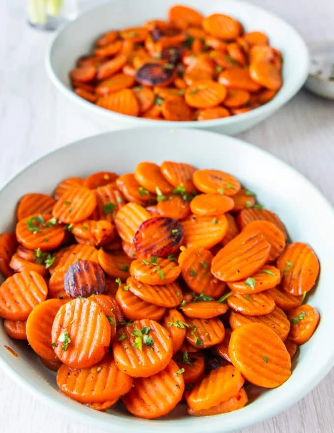 close up of golden sweet maple glazed carrots