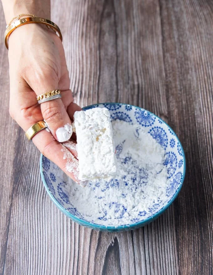 lightly coated rice chunks in flour for better crust