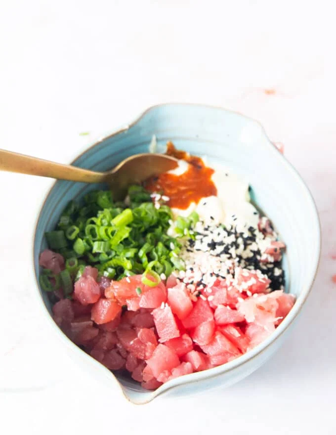 tuna topping ingredients prepared and ready to mix in a bowl
