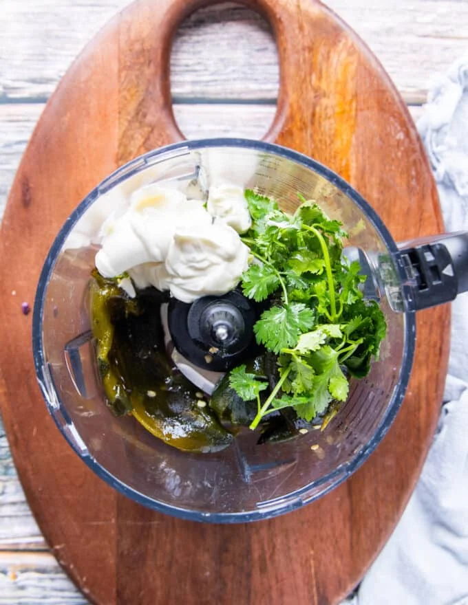 All ingredients for poblano sauce in a blender