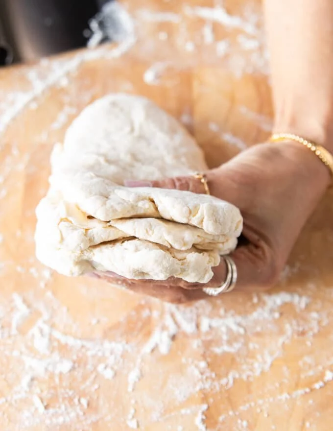 The layered dough stacked on top and now the dough is ready to roll