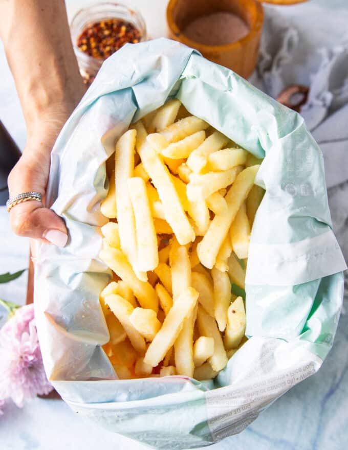 Frozen fries in a bag ready to cook