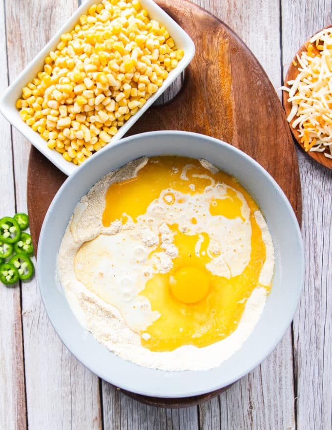 The wet ingredients are added to the bowl with the dry ingredients to make the batter.