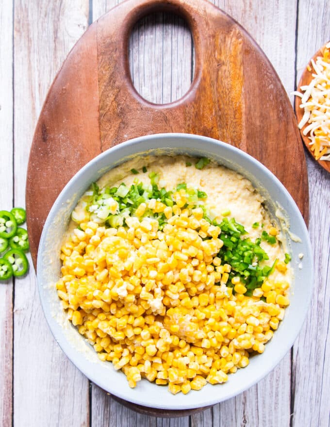 fresh corn kernels, diced jalapenos and scallions and some cheddar cheese added in the batter