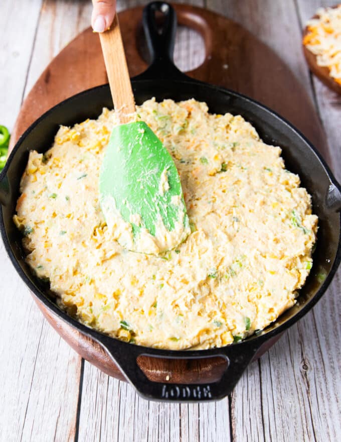 jalapeno cornbread batter spread evenly into a cast iron skillet